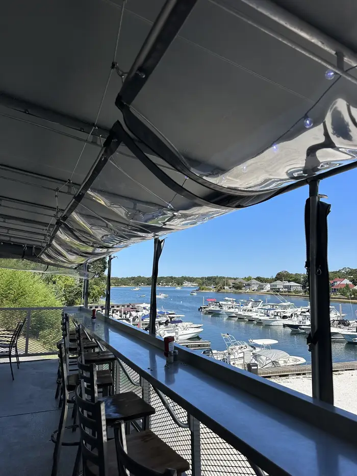 The deck at Stonebridge overlooking the marina and Onset Beach