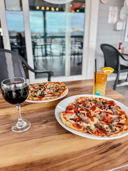 Pizza with a glass of red
